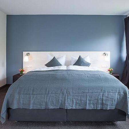 Alpengluehen Smart Hotel Ольхинг Номер фото